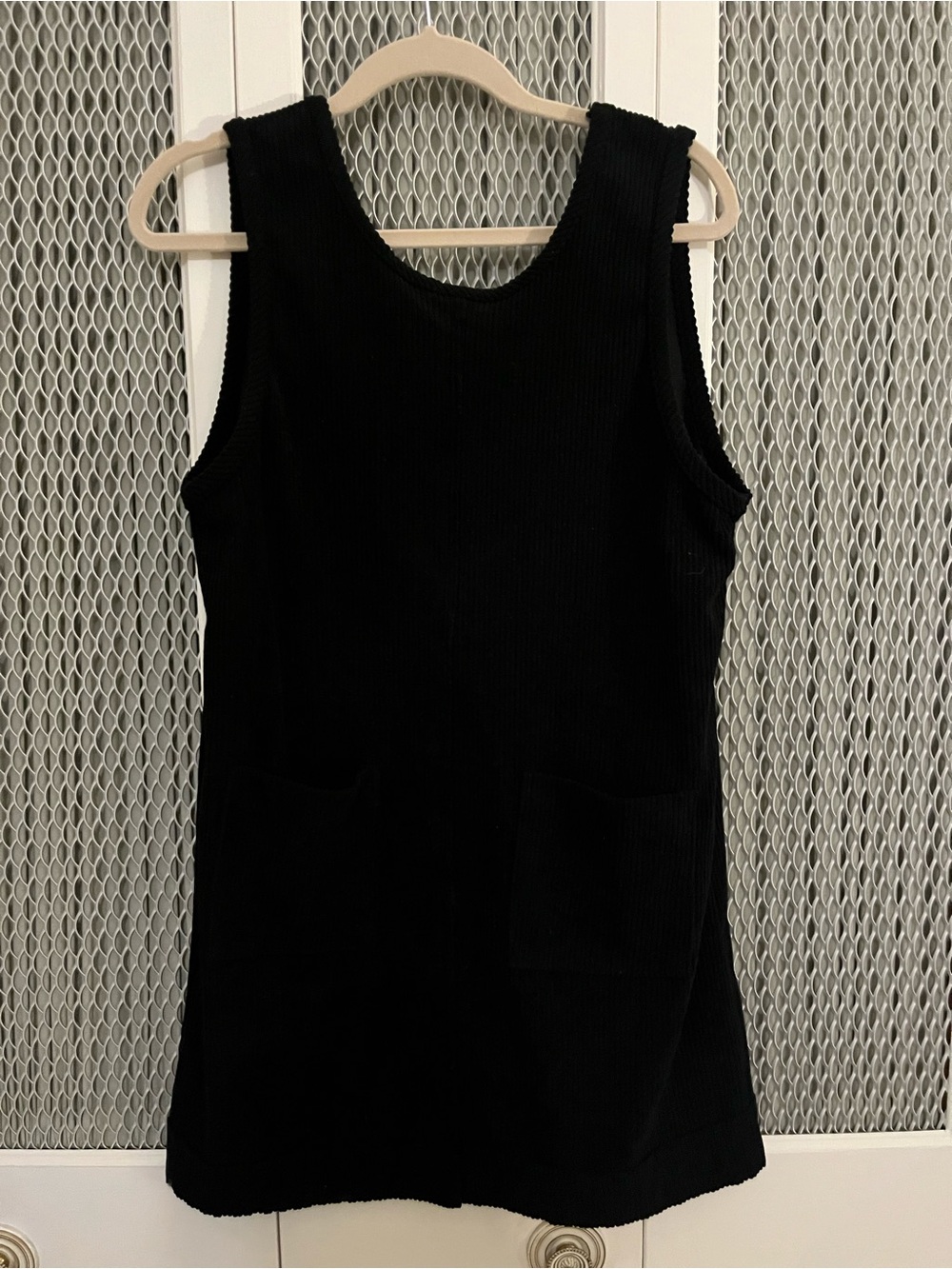 Black Ribbed Sleeveless Tunic with Front Pockets